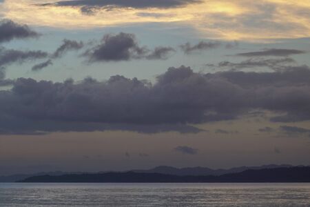 dramatic sky after sunset  on the sea  in raja ampat archipelago