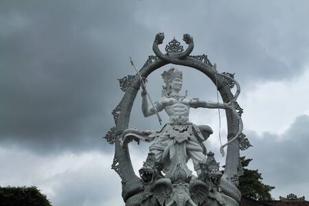 large statue of Aryuna the warrior from Mahabharata on the road crossing in Baliの写真素材