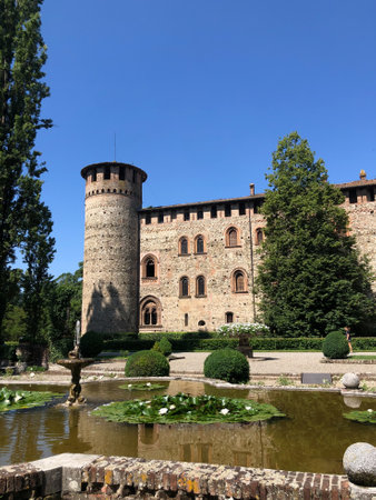 Grazzano Visconti, italy - june 11, 2023: view from the fountain of medieval castle of Visconti di Modrone in Piacenza provinceのeditorial素材