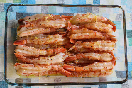 raw shrimps or prawns in marinating sauce, view from aboveの写真素材