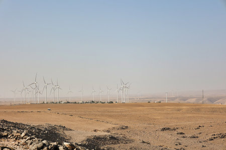 wind turbines for electric power production in a desert area of Jordanの写真素材