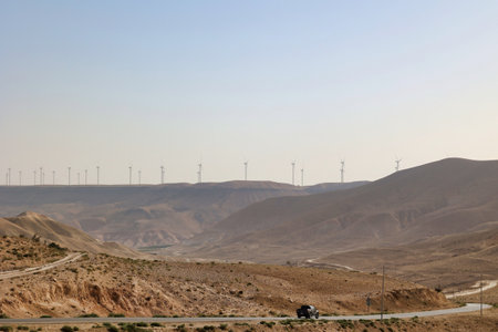 wind turbines for green electric power production in a desert area of Jordanの写真素材