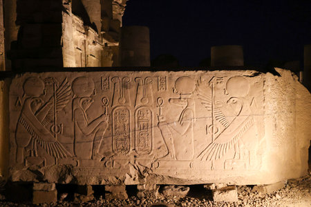 ancient egyptian hyeroglyphs in Kom Ombo temple at night, Egypt.の写真素材