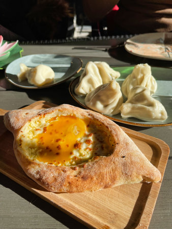view of Khachapuri, traditional Georgian pastry with cheese and eggの写真素材