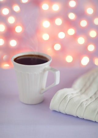 Cup of hot lavender chocolate on the tableの写真素材