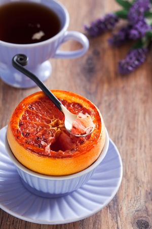 Grilled grapefruit half for breakfast, selective focus の写真素材