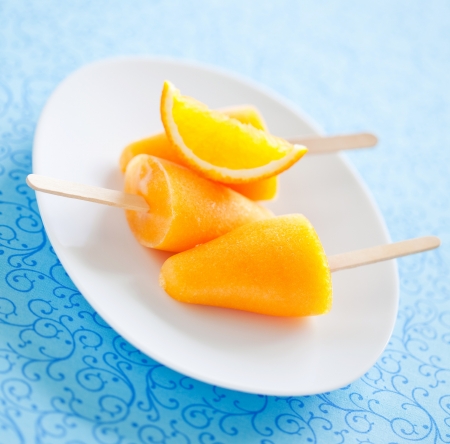 Orange ice lollies, selective focus の写真素材