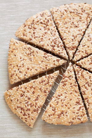 Flax seeds and sesame flat bread, selective focusの写真素材