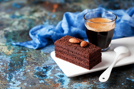 Piece of chocolate cake and coffee, selective focusの写真素材