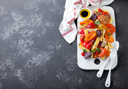 Grilled vegetables served on a ceramic board, selective focusの写真素材