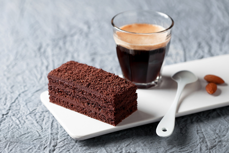 Piece of chocolate cake and coffee, selective focusの写真素材