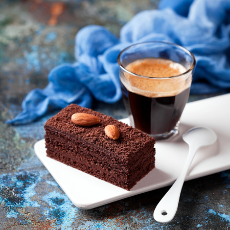 Piece of chocolate cake and coffee, selective focusの写真素材