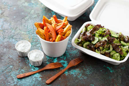 Roasted sweet potato and celery root, salad with vegetables and smoked oysters and coconut yogurt...