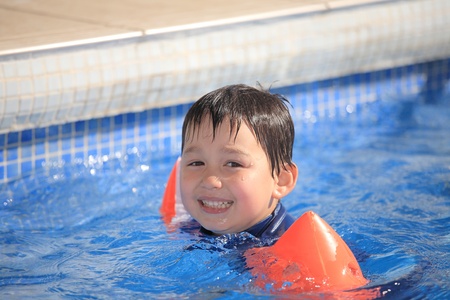 child in the swimming poolの写真素材