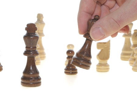 Chess game close up with handの写真素材