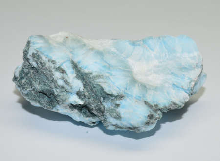 Larimar gemstone raw stone on white