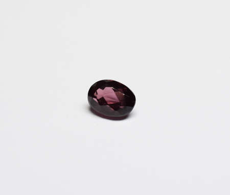 Faceted rhodolite garnet gemstoneの写真素材