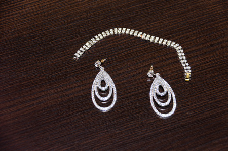 earrings and bracelet with gemsの写真素材