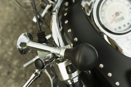 handmade horn on the bike handlebar and speedometerの写真素材