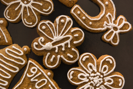 decorated gingerbread on baking sheetの写真素材