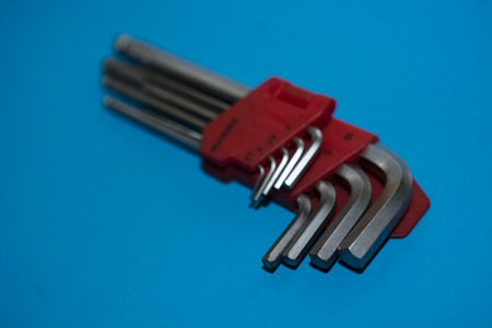 set of Allen wrenches on a blue backgroundの写真素材