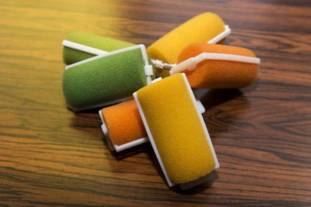 Old colored foam curlersの写真素材