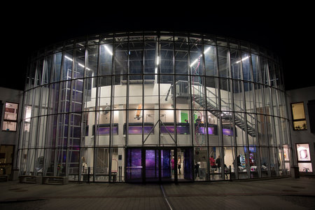 building glazed with entrance illuminated the evening with a motif of space insideのeditorial素材