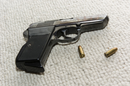 firearm located on the carpet with hub