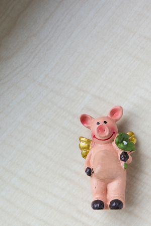 A plastic figurine piglet for good luck.の写真素材