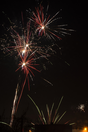 Fireworks over family houses.の写真素材
