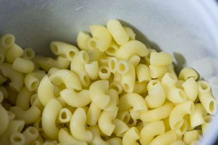 Boil the pasta in the pot nodes.の写真素材
