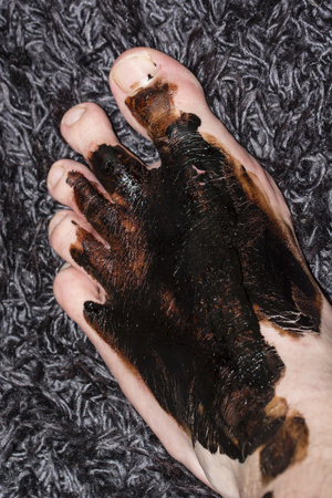 Peat mask on the feet.の写真素材