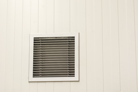 Ventilation grid in the wall.の写真素材