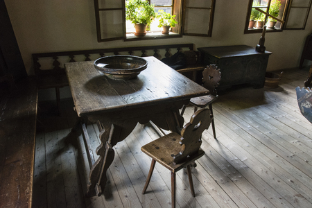 Interior wood with table, chairs and windows.の写真素材