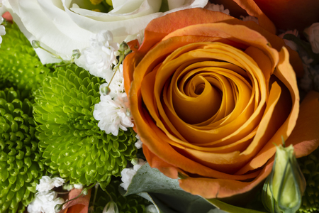 Orange flower rose in bouquet.の写真素材