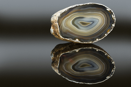 Mineral agate and its reflection.