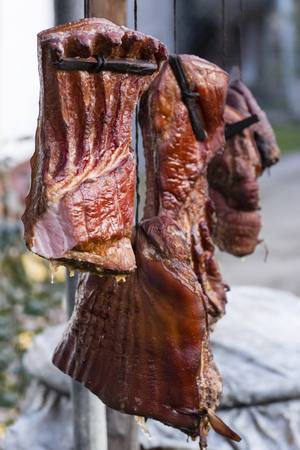 Suspended smoked meat - domestic production.の写真素材