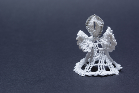 A handkerchief knitted white with a black background.の写真素材