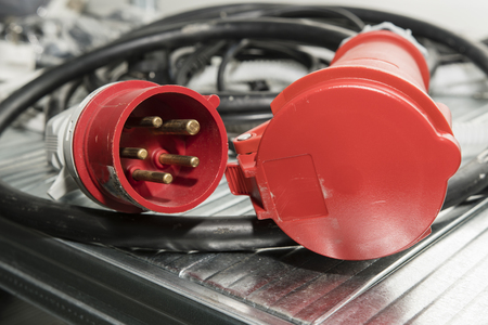 Fork and socket for three-phase voltage.