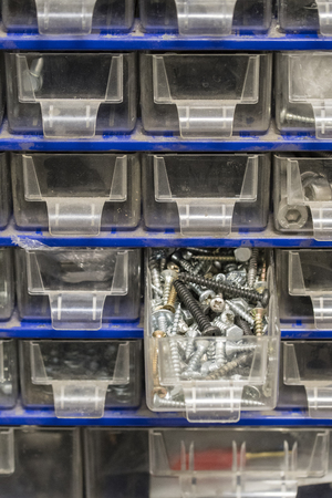 Expanded plastic drawer with screws.の写真素材