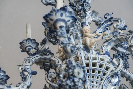 Porcelain chandelier candle with angel playing violin.の写真素材