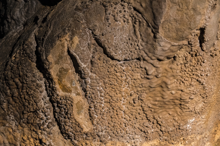 Outlets on the wall in the cave.