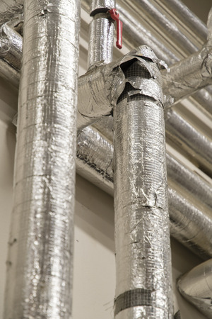 Removable aluminum cover for piping.の写真素材