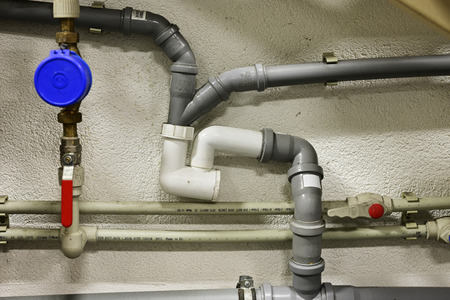 Water flow measurement - water meter on pipe by lever.