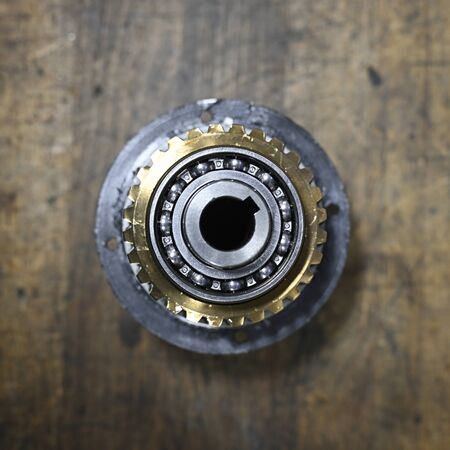 Brass gear on gearbox parts.
