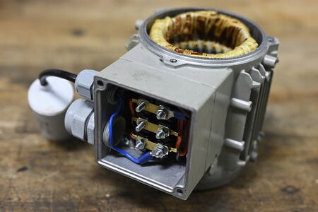 Electric motor with stator exposed.