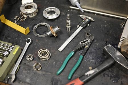 Unfolded tools on locksmith's workshop.の写真素材