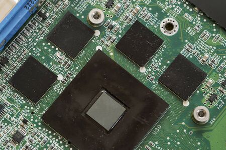 Processor on laptop motherboard in detail.