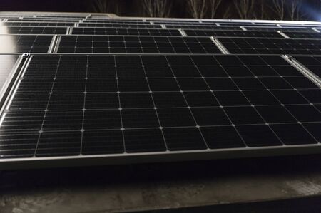 Illuminated panels on the evening roof.