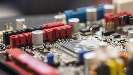 SATA connectors on computer motherboard in row.